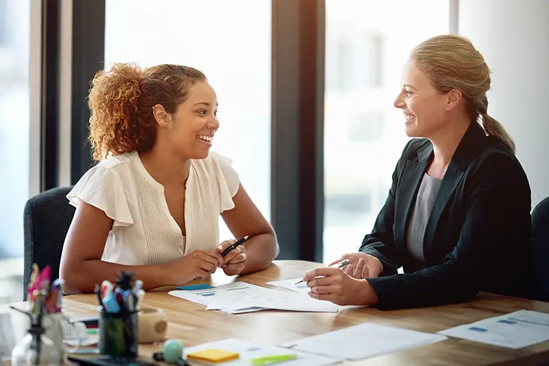 Woman meeting with car accident lawyer