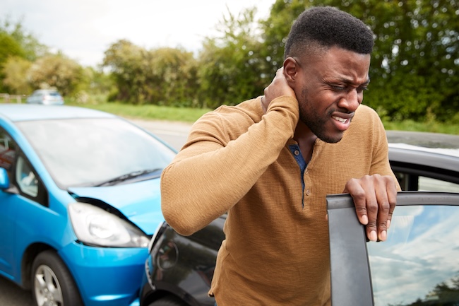 Car accident scene in Georgia where self-employed driver lost income and business revenue during recovery