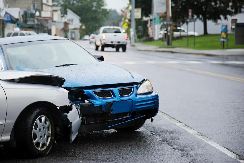 Georgia car accident victim reviewing vehicle appraisal documents for diminished value claim