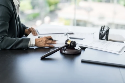 Bus accident lawyer from Atlanta Accident Lawyers working on a legal case
