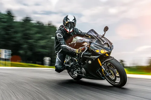 Motorcyclist going fast