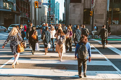 crowd of pedestrians in a crosswalk