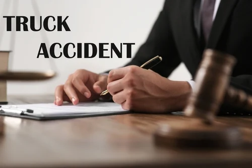 An Atlanta truck accident lawyer reviews evidence for a legal case.